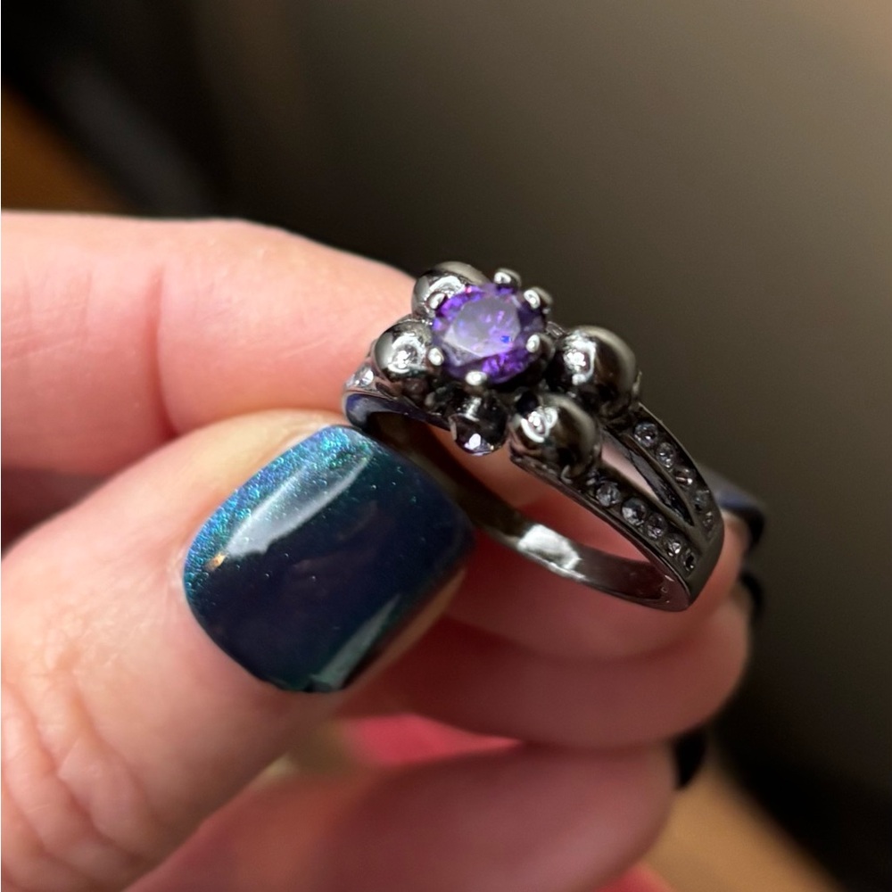 Brand new black/dark grey ring. Size 9.